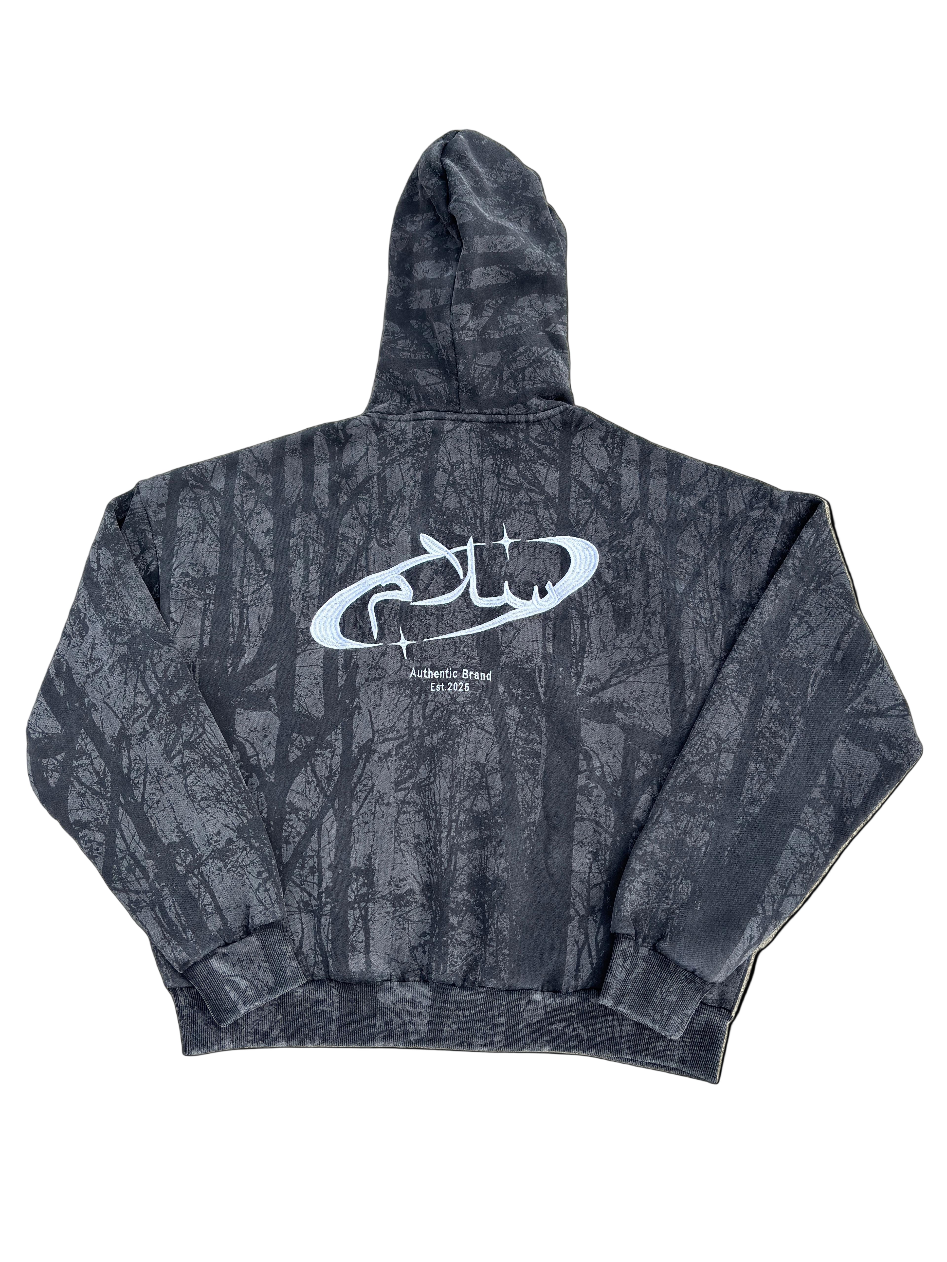 Gray hoodie with a logo on a beige surface