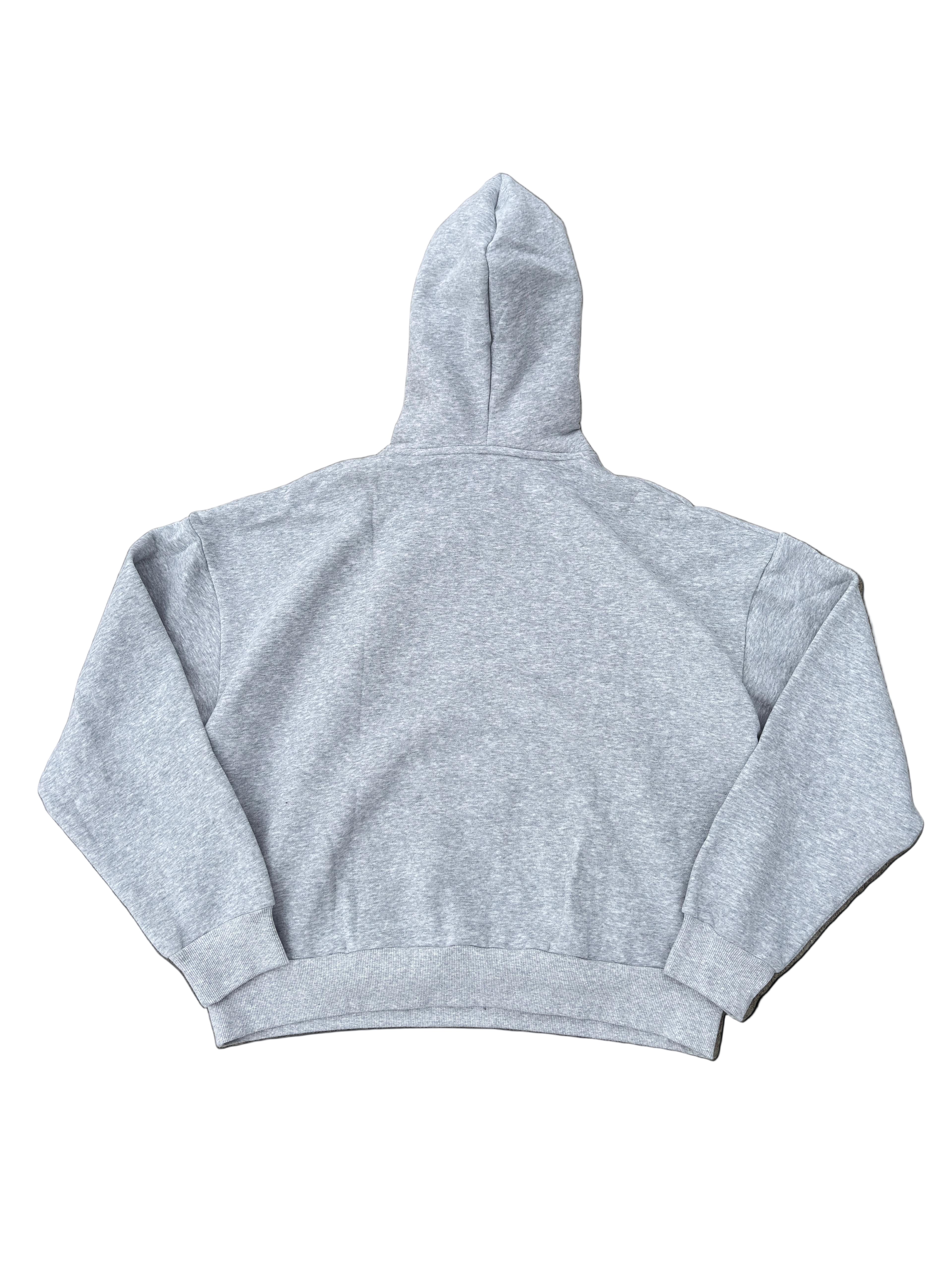 Gray hoodie on a textured gray background